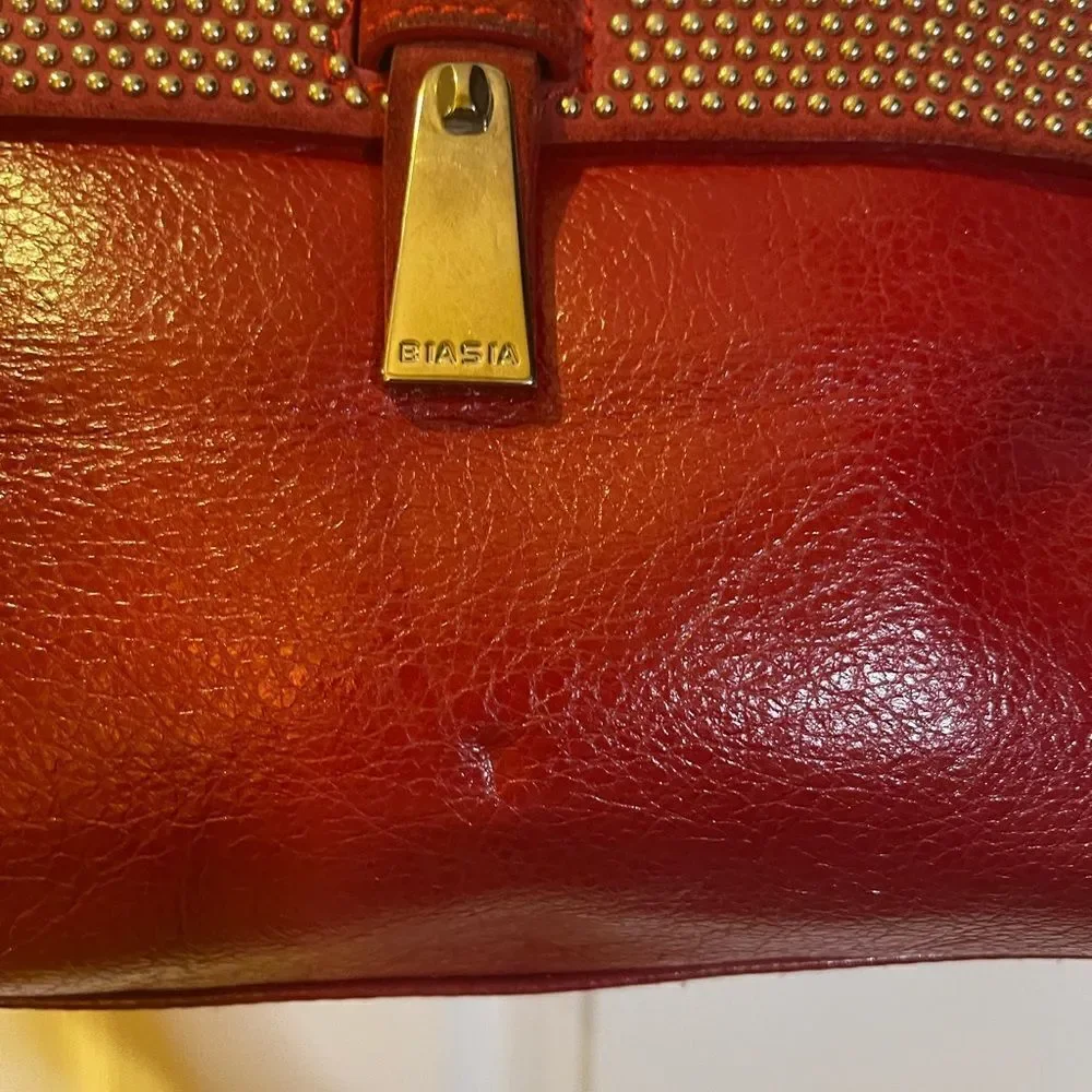 Francesco Biasia leather & suede deep Red medium Satchel gold studs accents.